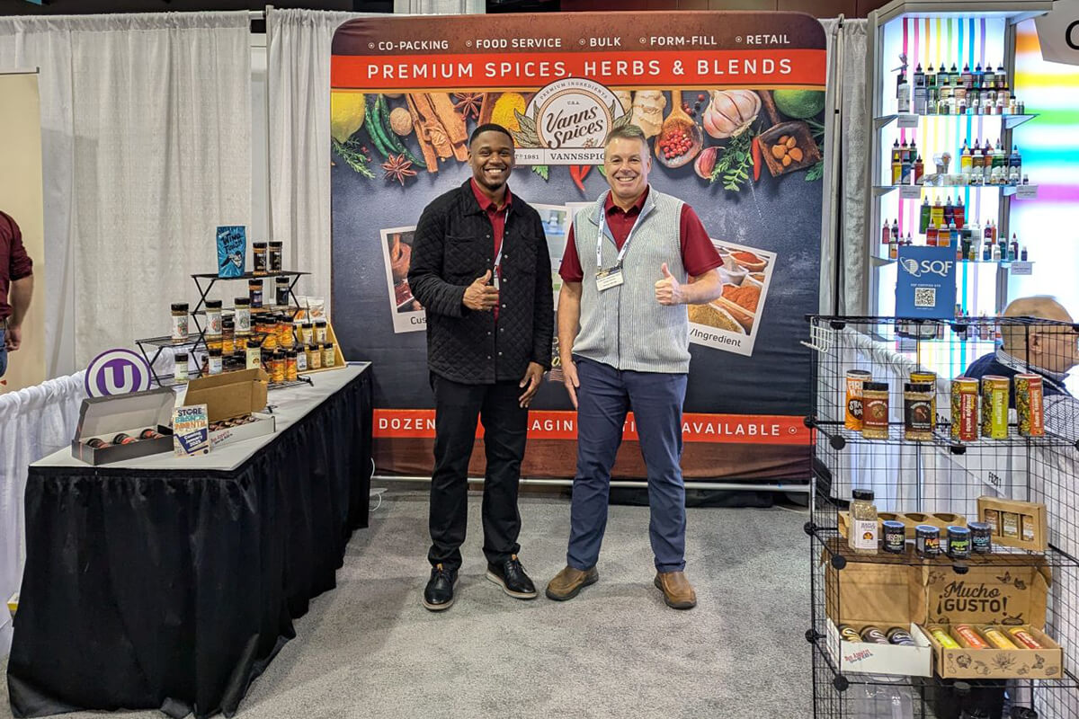 Bob Hoenscheid (retired) and Donnie Coles Jr. proudly display Vanns Spices (2024 show)